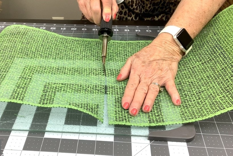 cut poly burlap with wood burning tool