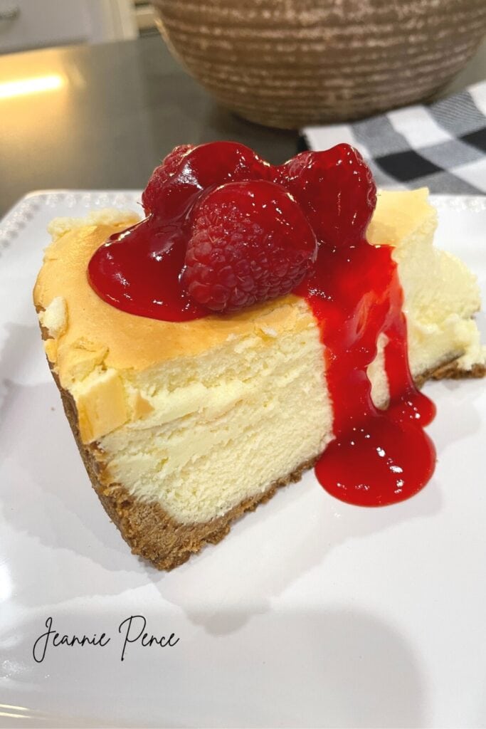 cheesecake with raspberries and simple syrup