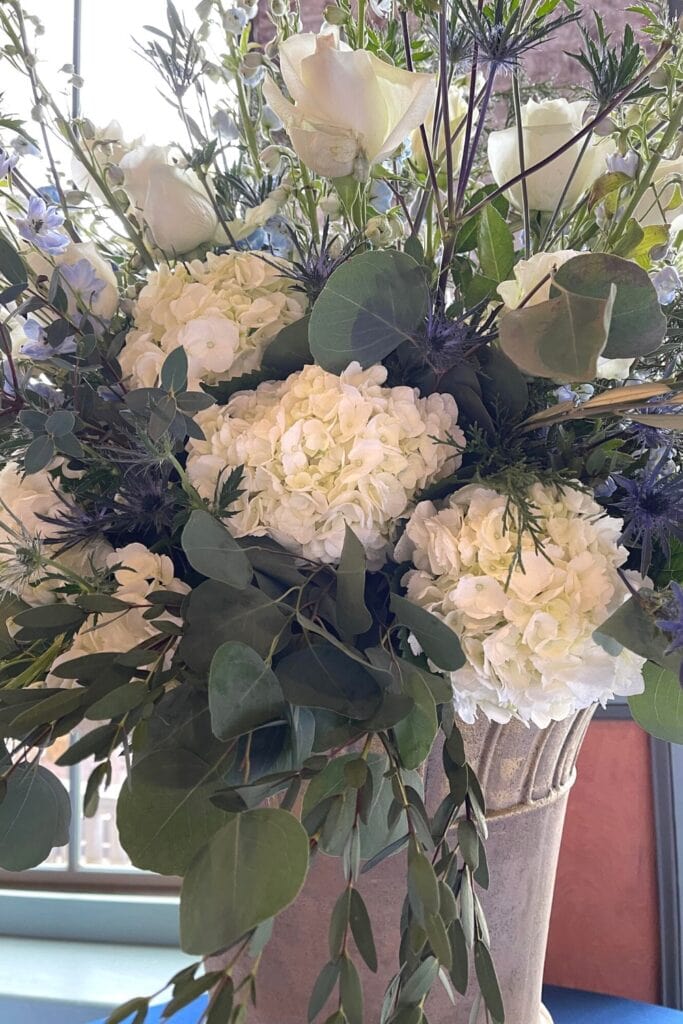 eucalyptus in floral arrangements with white hydrangeas