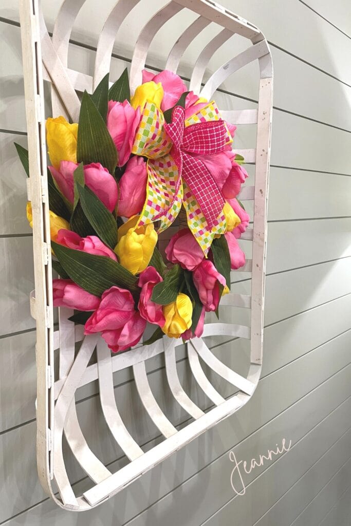 hang a spring tulip wreath inside a tobacco basket