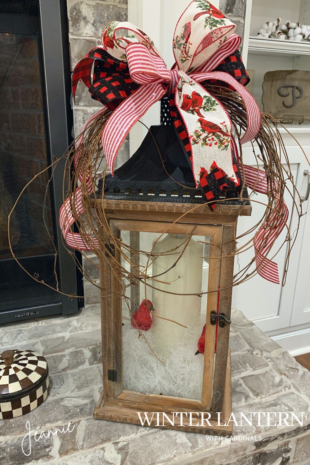 decorate a lantern for winter with red birds