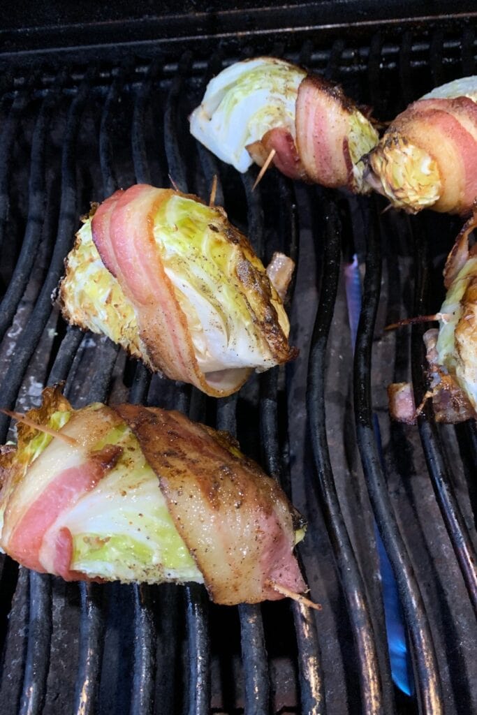 bacon wrapped cabbage on the grill