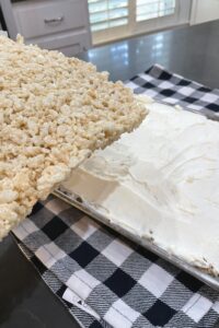 layer the second pan of rice krispies on top