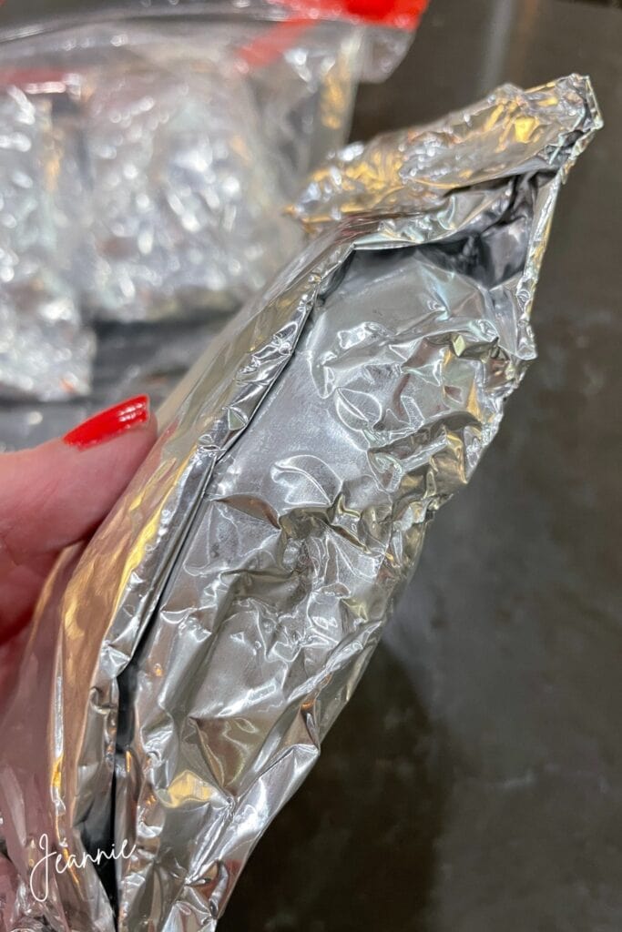 beef filet wrapped in tinfoil and stored in ziplock bag in freezer