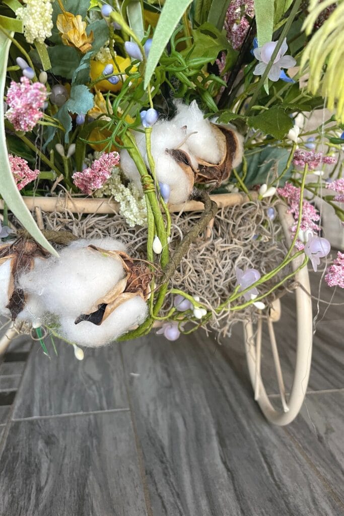 cotton bolls in a spring floral arrangement