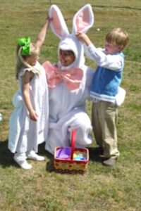 grandmother dressed up in an easter bunny suit