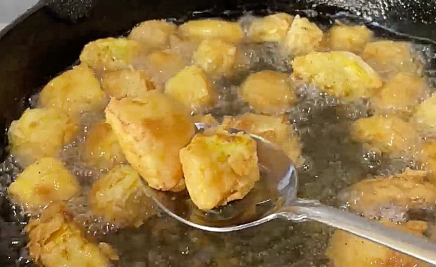 fry battered squash and onion until golden brown