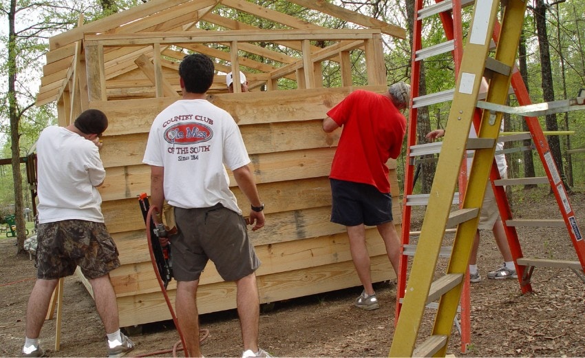 putting the side planks on the playhouse