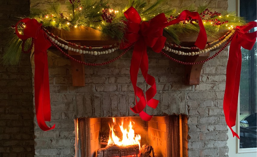 wood bead garlands on fireplace mantel