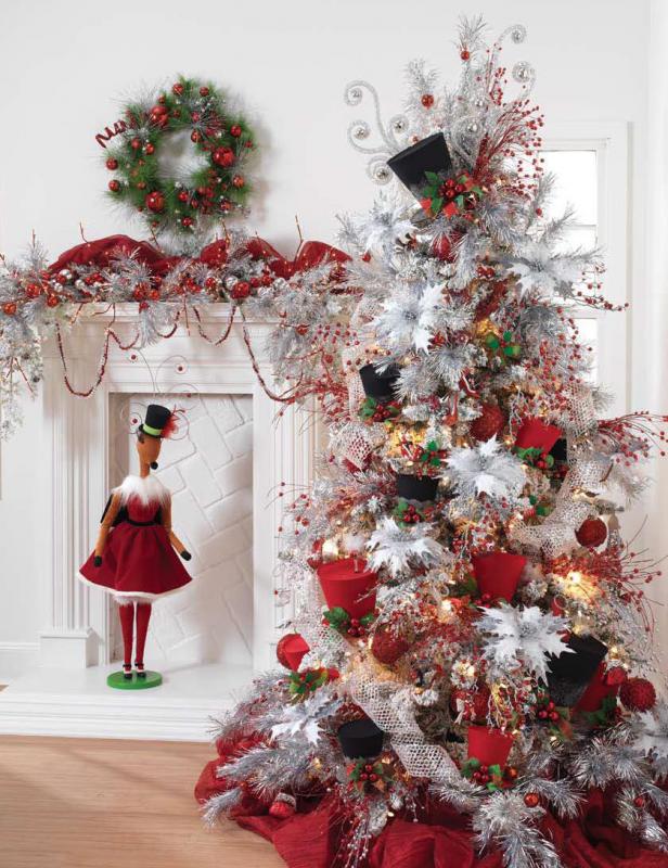 christmas tree with bling, red and black top hats, silvery poinsettias and velvet ribbon