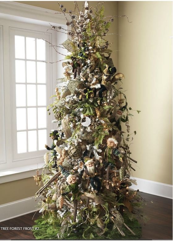 woodland elves, foxes, bundles of branches on a nature themed christmas tree