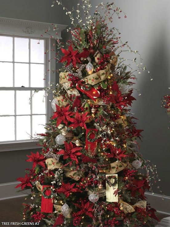 fresh greens with huge red poinsettias, embroidered ribbons, holly and cedar picks