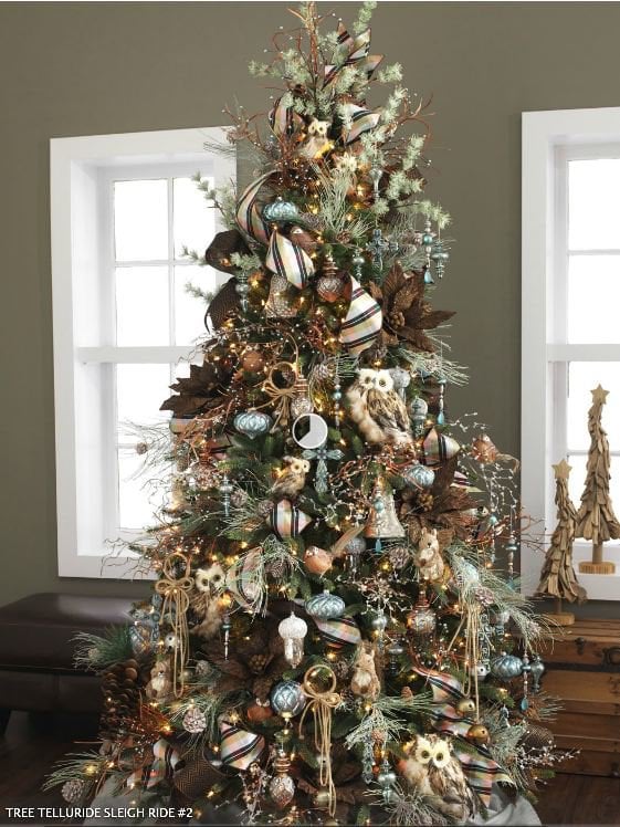green tree with chocolate and bronze ornaments, pale blue accents, wide plaid ribbons, owls and tiny lights