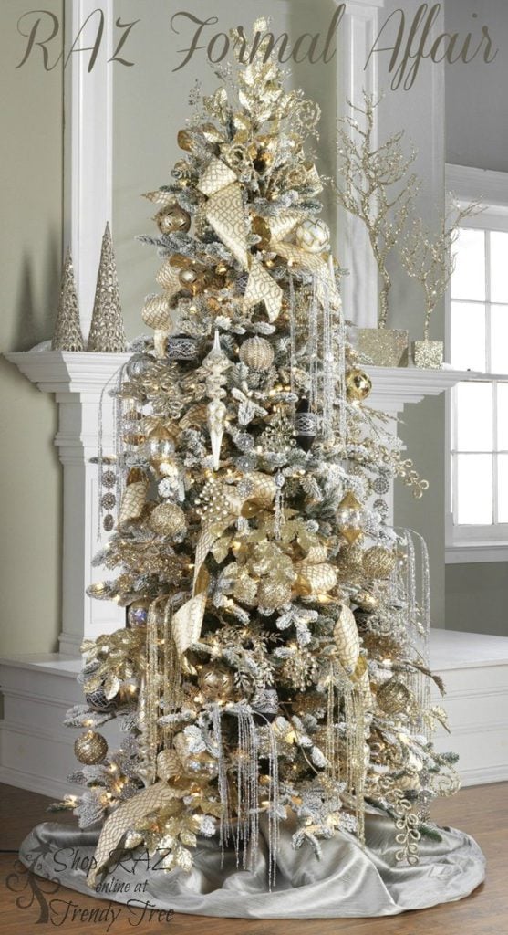silver, champagne and gold elegant ornaments, clear crystals, shiny beads on a christmas tree with silver skirt