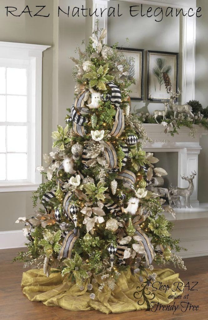 lime green ornaments with white feathered owls, natural ribbon and bold black and silver striped ribbon, gold pinecones and gold tree skirt for an elegant but natural christmas tree