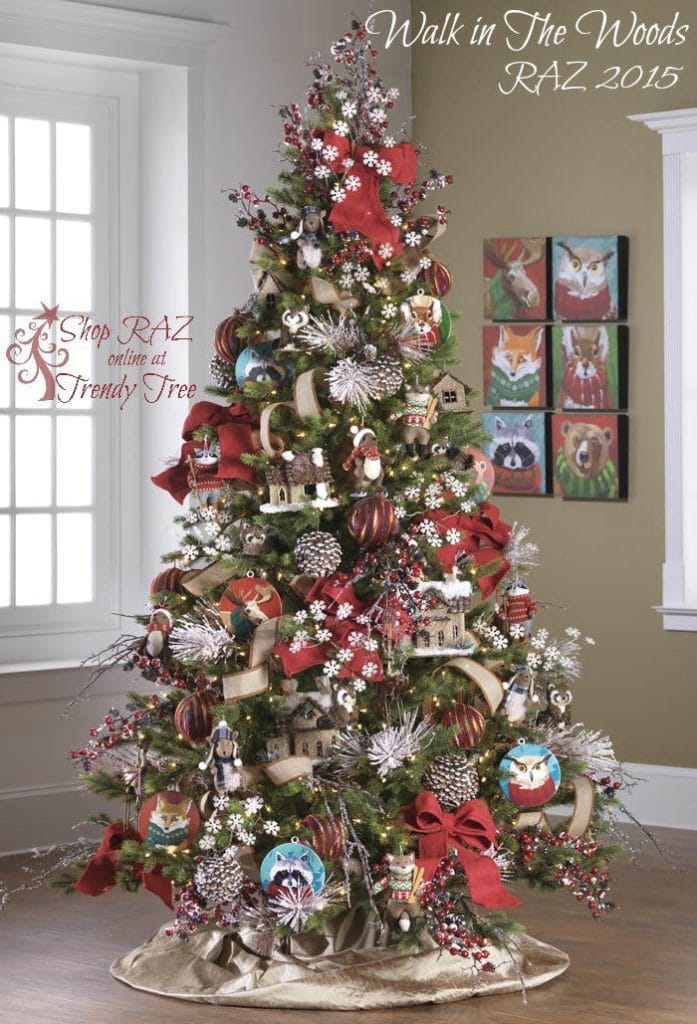 christmas tree with animal ornament, pinecones and wooden snowflakes