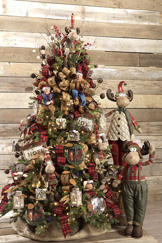 cabin or lodge christmas tree decorated with woody animal and big moose