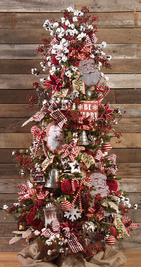 farmhouse style christmas tree with candy canes, red and natural colors, red berries and classic santas