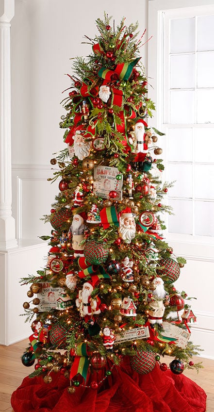 santa's workshop christmas tree with classic santas and vintage style ornaments, retro garlands