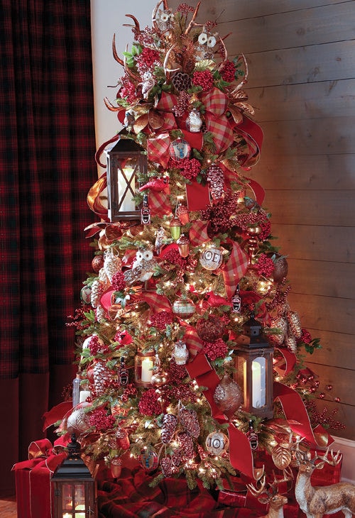 Copper mountain tree with lantern ornaments, big red berry. ornaments, pinecones and plaid ribbons