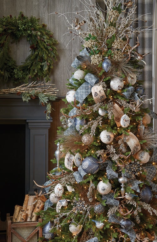 holiday dreams tree with light blue plaids, blue and cream ornaments, natural wood look ribbons, gold and platinum antler sprays, pine sprays and twigs.
