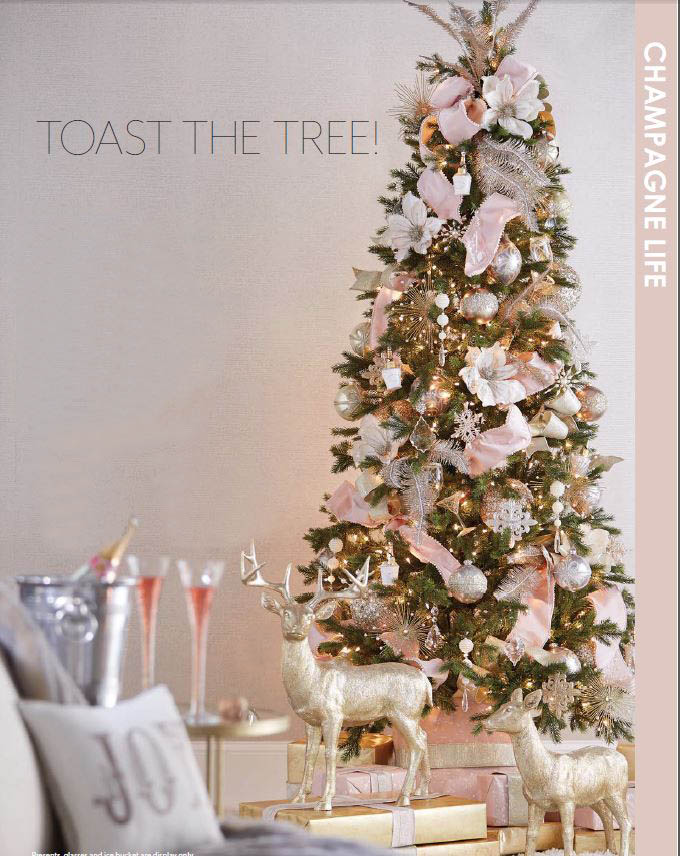 pine, white, silver and crystal christmas tree with touches of gold, silvery reindeer, snowflake ornaments and white pink ribbons