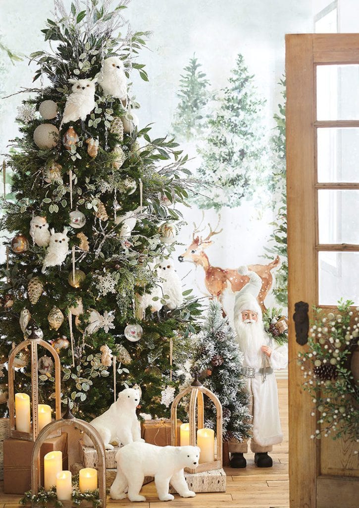 pine tree with eucalyptus sprays, white feathered owls, pinecone ornaments, snowflakes, icicle ornaments, icy branches