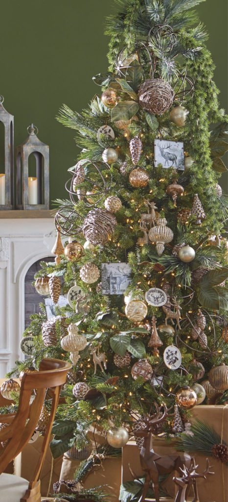 warm gatherings christmas tree with glittered twig balls, frosted bronze pinecone ornaments, deer ornaments, bronze cone trees, gold accents, deer figurines