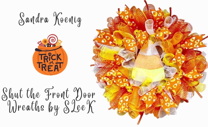 curly deco mesh wreath with candy corn sign and candy corn ribbon