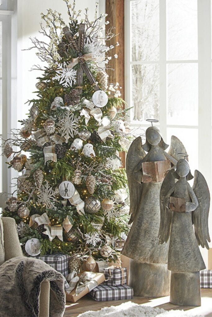 pineone lodge christmas tree with snowy snowflakes, white feathered owls, icy twigs, glittery pinecones