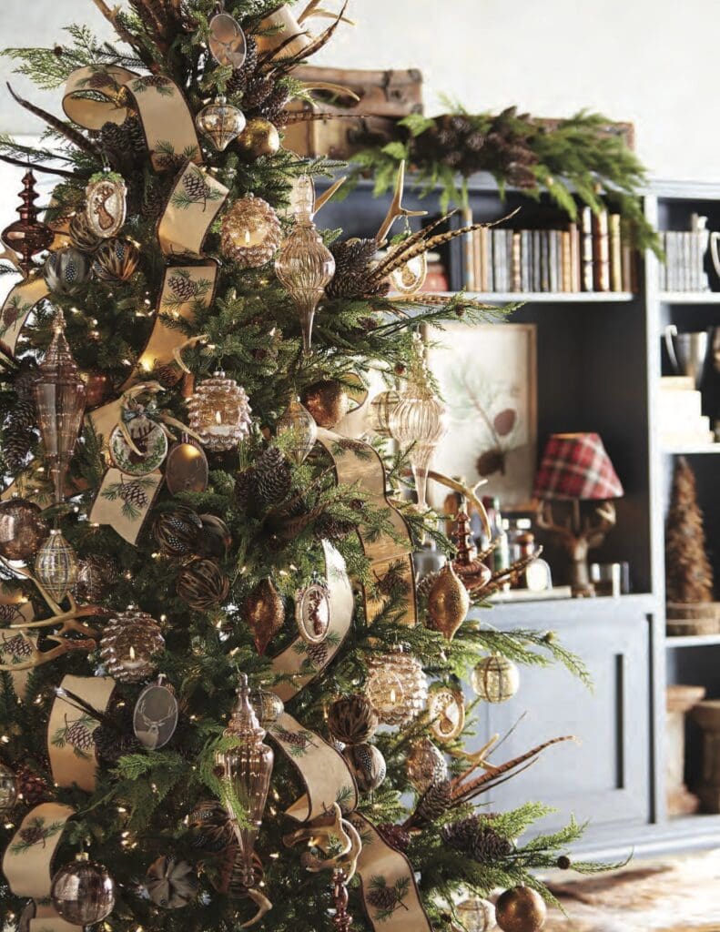 Christmas at the lodge tree, with embroidered burlap pinecone ribbon, antler ornaments, glass pinecone ornaments, bronze finial, pheasant feather picks, deer ornaments