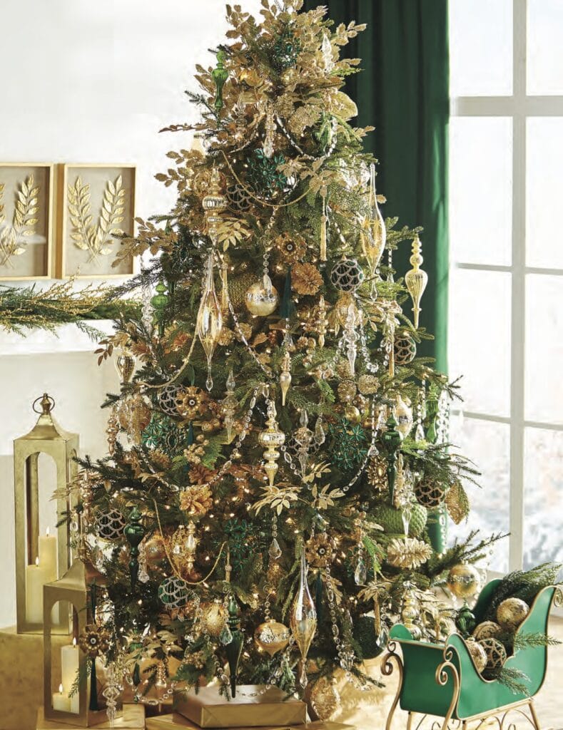 If you love elegance, this over-the-top Evergreen and Gold tree will be perfect for you! Rich colors from subtle to burnished golds, and deep emerald greens. Clear crystal garlands, glittery gold leaf spays, and bejeweled ornaments. Can you imagine how this tree must shine at night! This tree would be great for those ornate ornaments collected through the years.