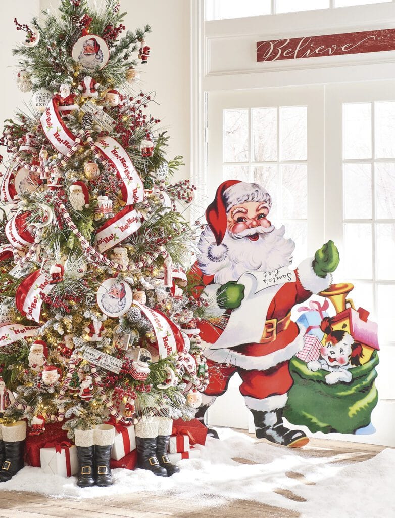 dear santa tree, with classic santa faces, doubled ho ho ho ribbon, black santa boots, peppermint candy garland, red berry sprays, believe ornaments