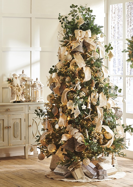 natural looking tree with eucalyptus, cream berries, pinecones, light natural ribbon, gold burnished ornaments