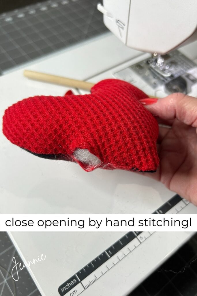 close opening on handmade christmas ornament with small stitches