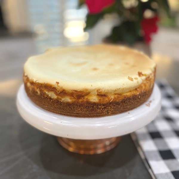 cheesecake on a pedestal cake stand