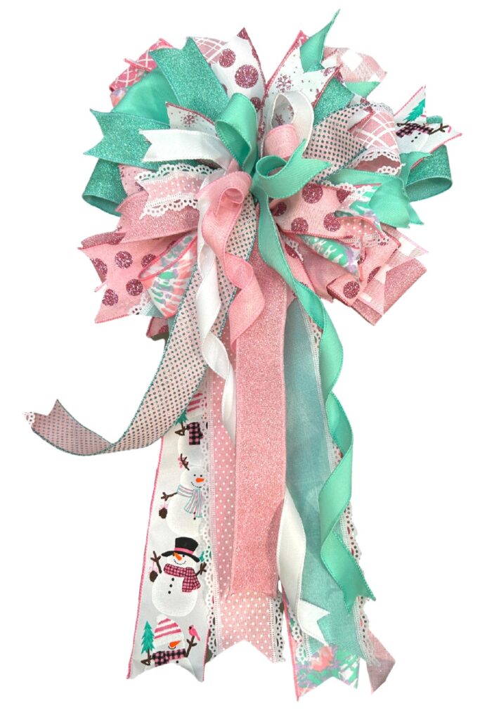 pink and mint green christmas bow made with the new wooden bow maker from craig bachman imports