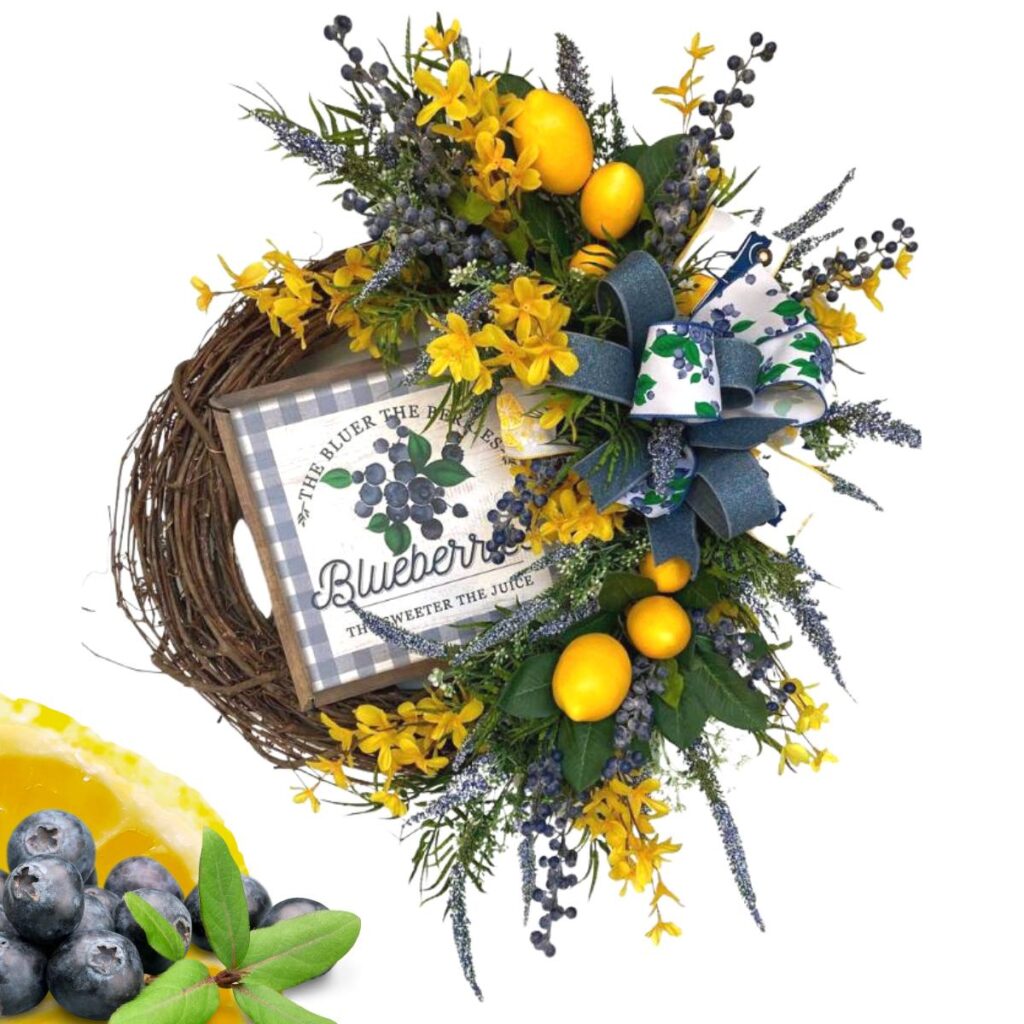 grapevine wreath decorated with lemons, blueberries, forsythia, blue astilbe and a pretty bow