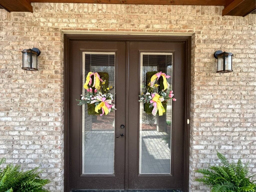 spring wall baskets on double doors