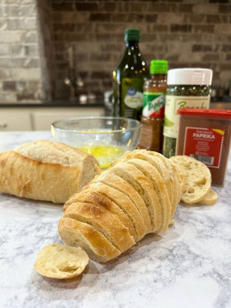french bread cut into slices to make crispy crusty bread or croutons