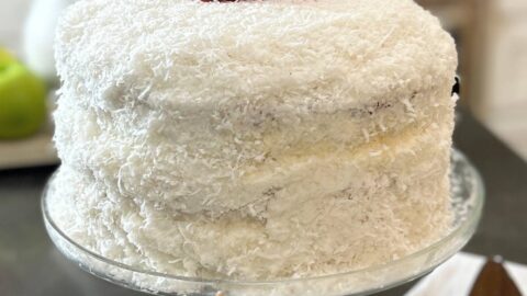 three layer coconut cake made with freshly grated coconut