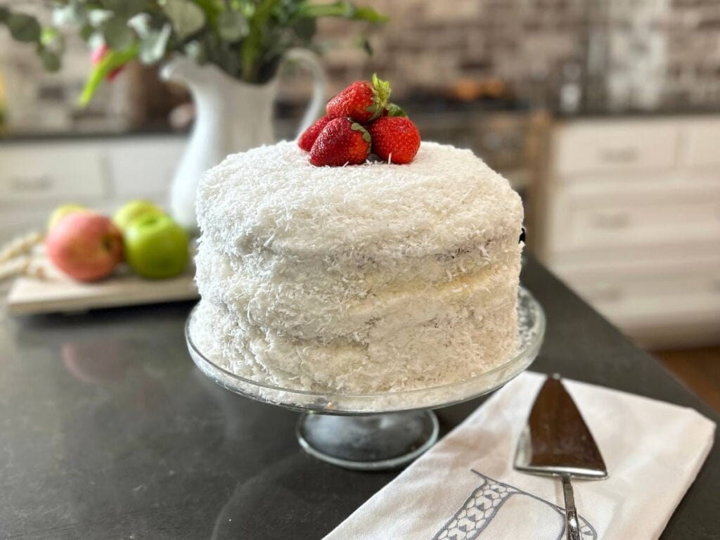 fresh coconut cake ready to serve, made with freshly grated coconut