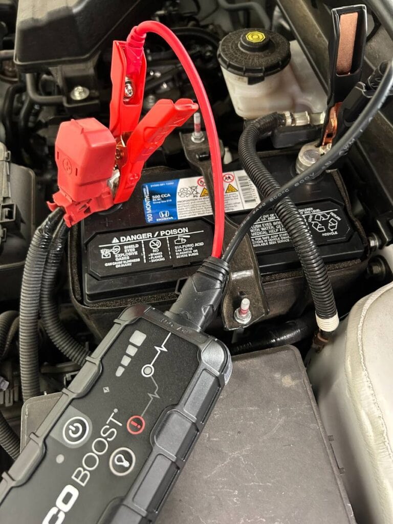 car battery with noco battery boost attached