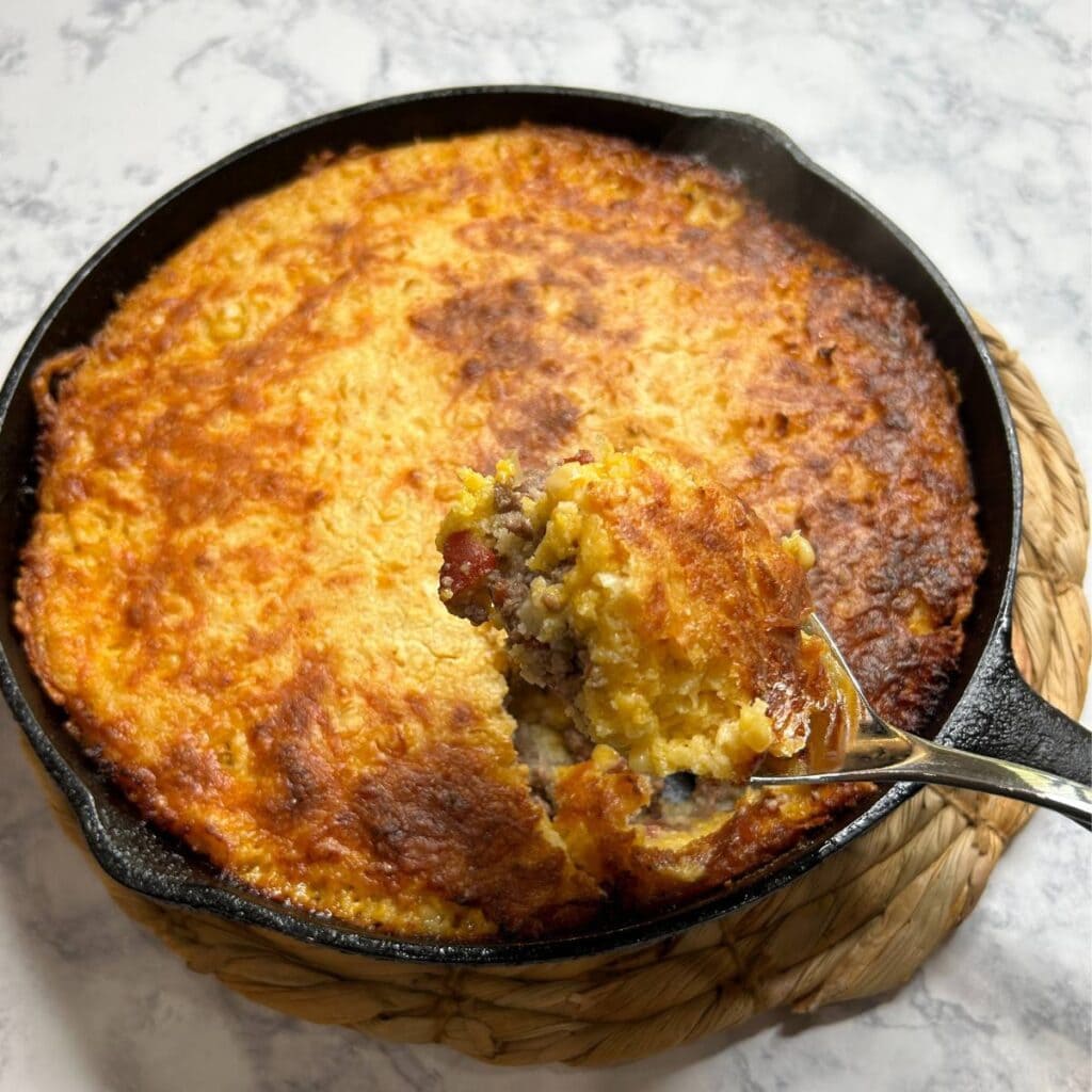 cornbread skillet dinner baked in a cast iron skillet