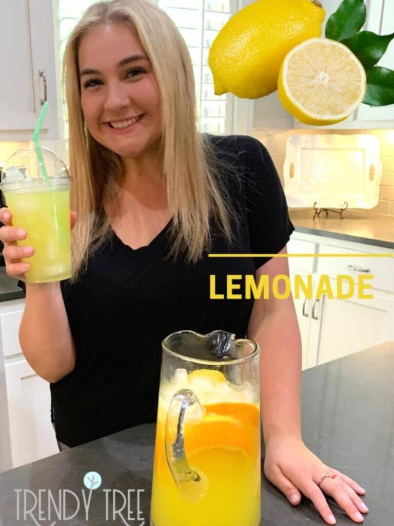 maggie holding a glass of lemonade