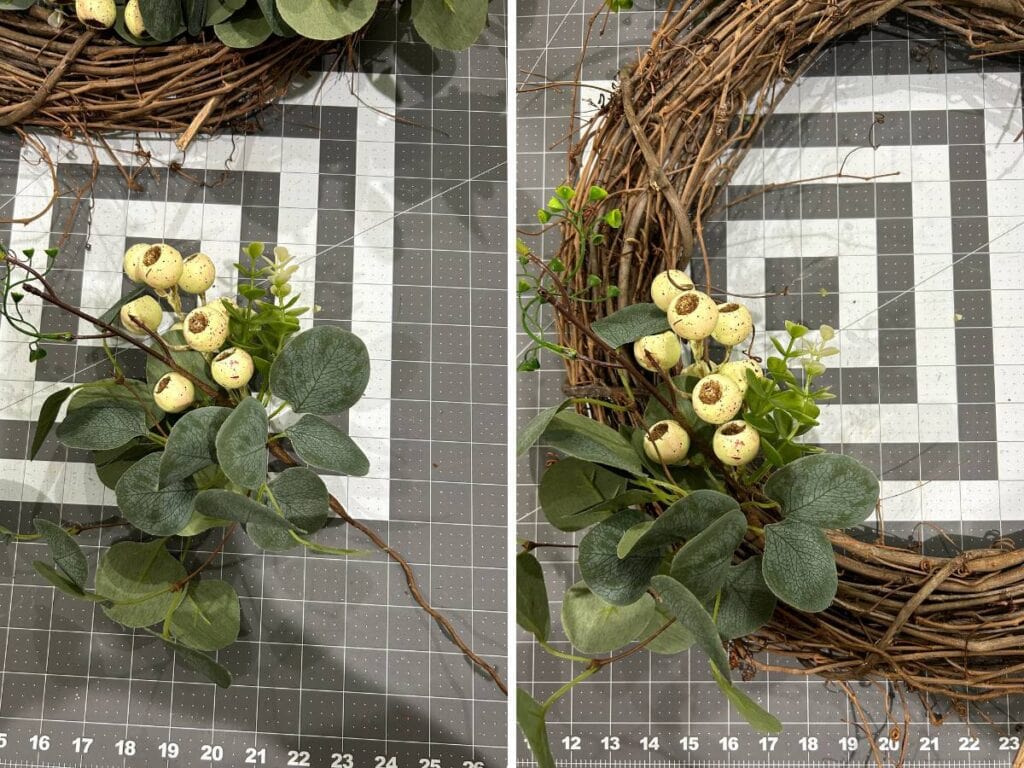 individual pieces of eucalyptus removed from small wreath to be applied o larger grapevine wreath form