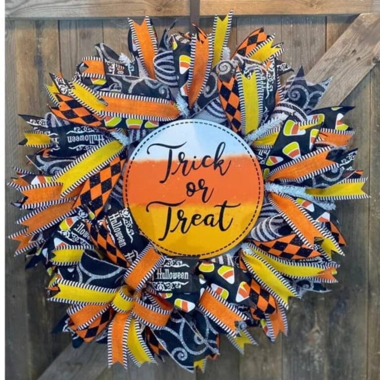wreath decorated with a candy corn decor