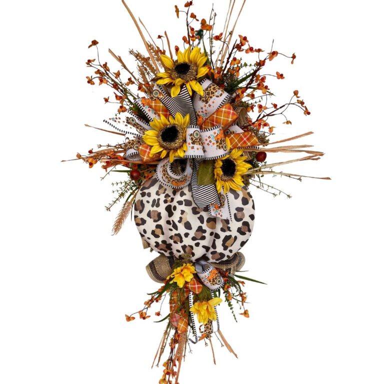 sunflower wreath made on a swag form, with animal print pumpkin and ribbon