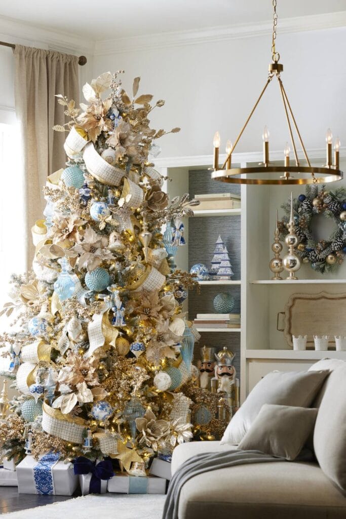 christmas tree decorated in light blue and gold