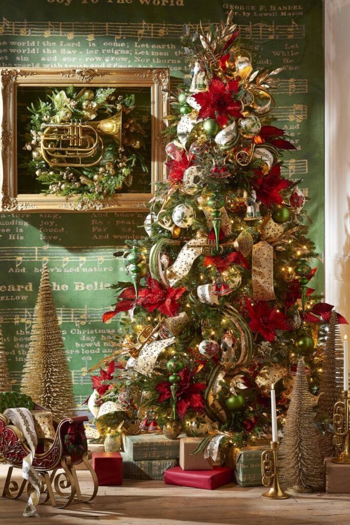 christmas tree covered with musical themed decorations, large finials, elegant wide embroidered ribbons, gold ornaments and deep red poinsettias